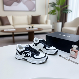 Chanel Black White Leather Sneakers Unisex